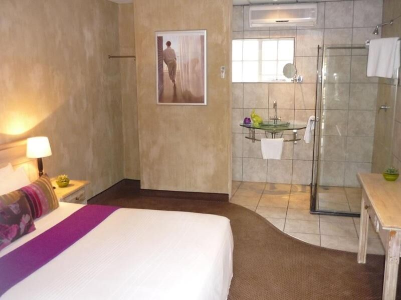 Comfortable bedroom at At SILVER PALMS
