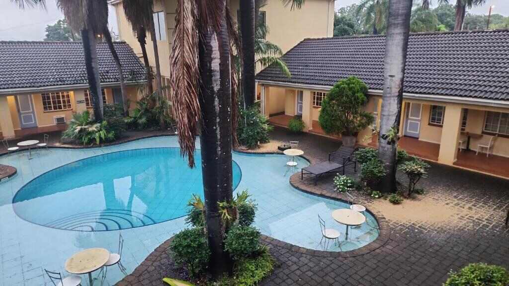 Terrace and garden seating at At SILVER PALMS